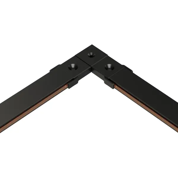 This 90-degree corner connector enables seamless directional changes in the innovative Continuum track lighting system. Ultra-lightweight and field-adjustable, it's perfect for creating custom lighting layouts. - alternate view