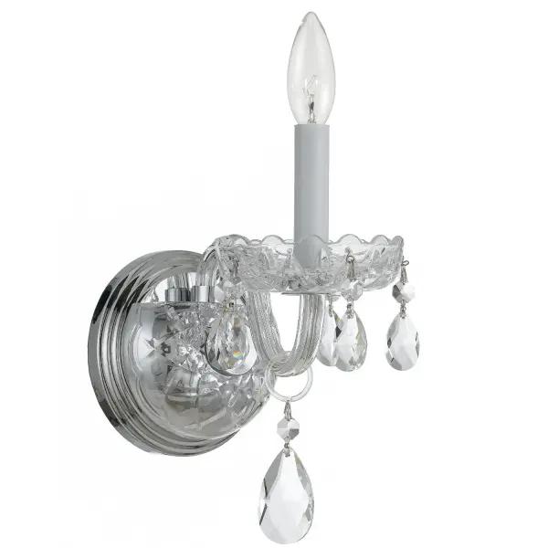 This 5-inch Traditional Crystal sconce delivers glamorous sparkle through optimally-cut crystal jewels arranged in decorative swags. The polished chrome finish and compact size make it perfect for adding elegant accent lighting. - alternate view