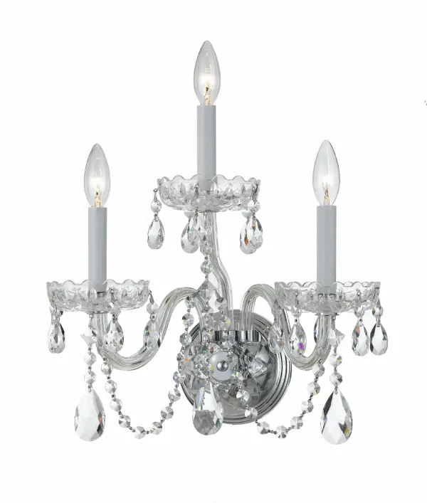This glamorous wall sconce features cascading crystal swags that create stunning sparkle and ambiance. The polished chrome finish and classic design make it a versatile choice for traditional and transitional interiors.