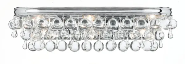 The Calypso vanity light brings sophisticated glamour to bathroom spaces with its abundance of clear crystal drops and balls. The polished chrome finish and contemporary design create a statement piece perfect for modern bathrooms.