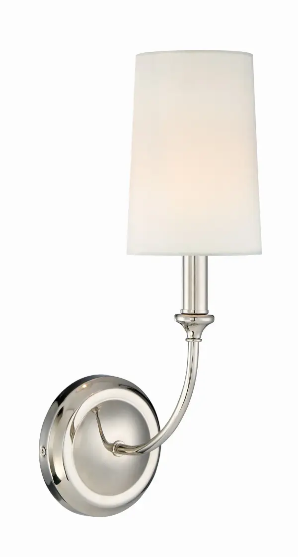 The Libby Langdon-designed Sylvan sconce combines timeless elegance with modern sensibility. Its open-air metal frame features delicate lines and sophisticated details that create visual interest without overwhelming.