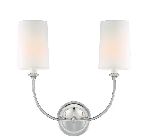 The Libby Langdon-designed Sylvan sconce combines classic elegance with modern sensibility. Its open-air metal frame creates visual lightness while sophisticated details add refined beauty to any space.