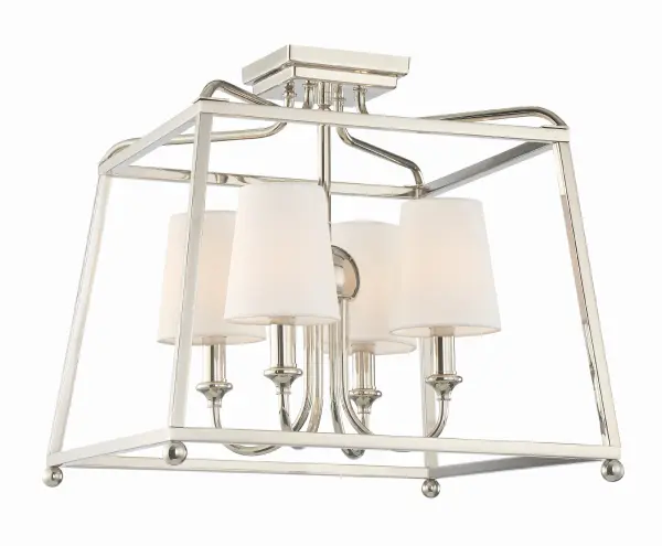 The Libby Langdon-designed Sylvan semi flush mount combines timeless elegance with modern sensibility. Its open-air construction and delicate metal framework create visual interest while maintaining spaciousness.
