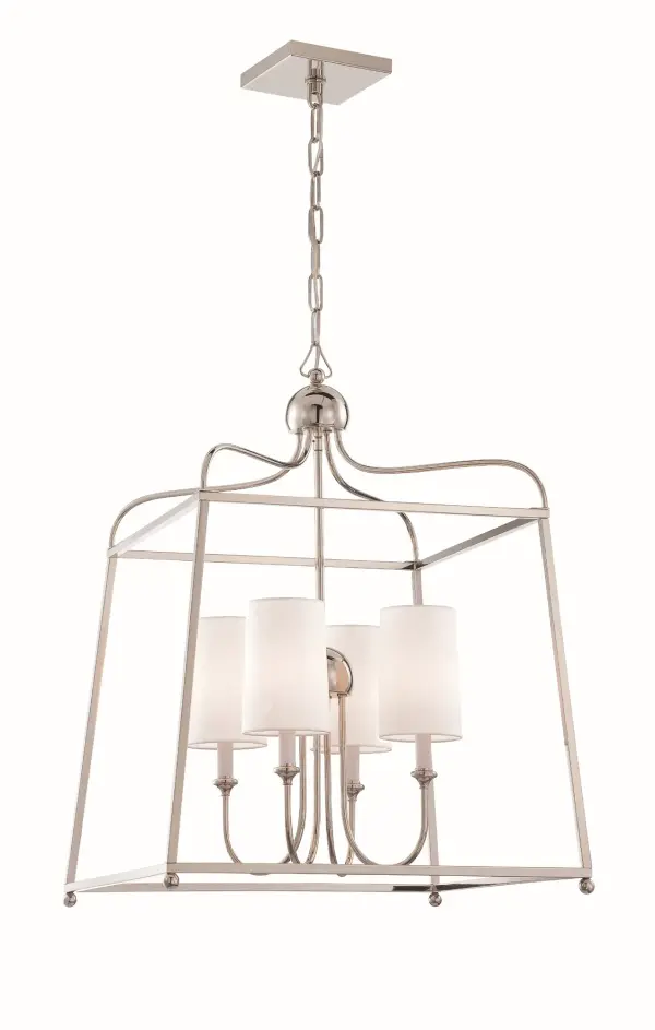 The Libby Langdon-designed Sylvan chandelier combines open-air construction with sophisticated metal detailing. Its 21.5-inch frame creates visual spaciousness while delivering classic elegance in a versatile Black Forged finish.