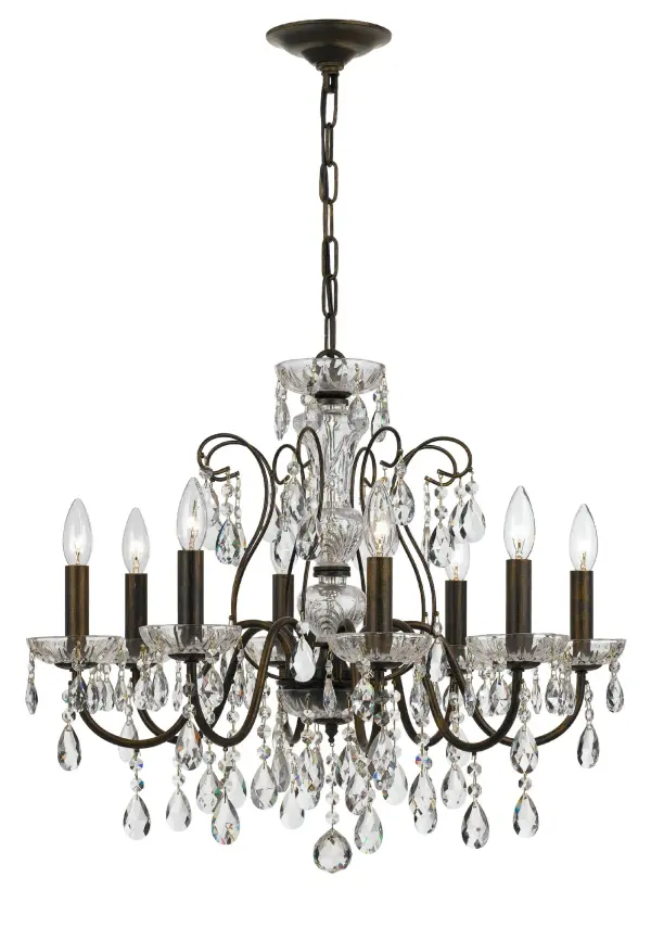 The Butler chandelier combines graceful crystal strands with a classic English Bronze frame, creating a sophisticated fixture that brings traditional elegance to any space. At 25.5 inches wide, it's perfectly sized for medium rooms.