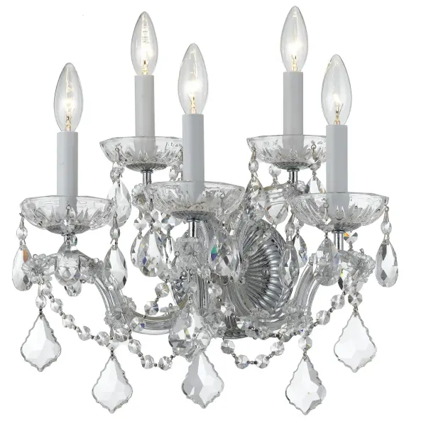 The Maria Theresa sconce brings luxurious traditional style with abundant crystal strands draped over a polished chrome frame. At 16" wide, it's perfectly sized for bedrooms, hallways, and closets where you want to add glamorous accent lighting.