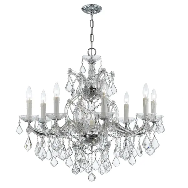 The Maria Theresa chandelier epitomizes classic luxury with abundant crystal strands draped over glass arms. At 26 inches wide, it delivers dramatic sparkle perfect for formal dining rooms, grand foyers, or upscale bedrooms.