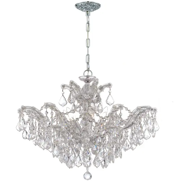 The Maria Theresa chandelier epitomizes luxury with abundant crystal strands cascading from glass arms. At 29 inches wide, this statement piece brings Old World glamour to dining rooms, foyers, and grand spaces.
