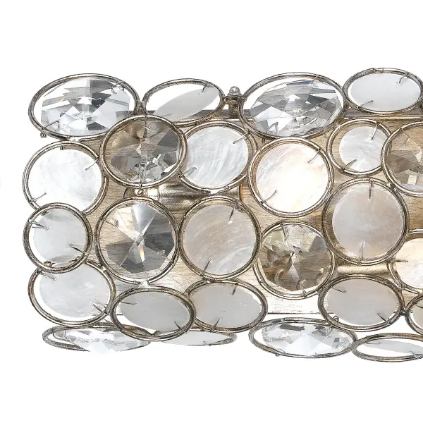 The Palla 24" vanity light brings organic glamour to bathroom spaces with hand-pinned natural Capiz shells. Its versatile design works beautifully in coastal, boho, or rustic settings while providing ADA-compliant illumination. - alternate view