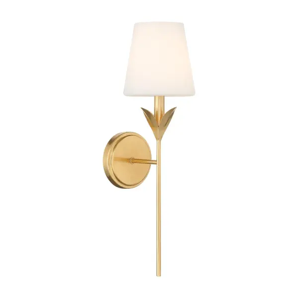 The Broche 6" Sconce features stunning wrought iron leaves in a shimmering Antique Gold finish. Its tailored elegance and unique floral design make it perfect for transitional homes while versatile enough for modern spaces.