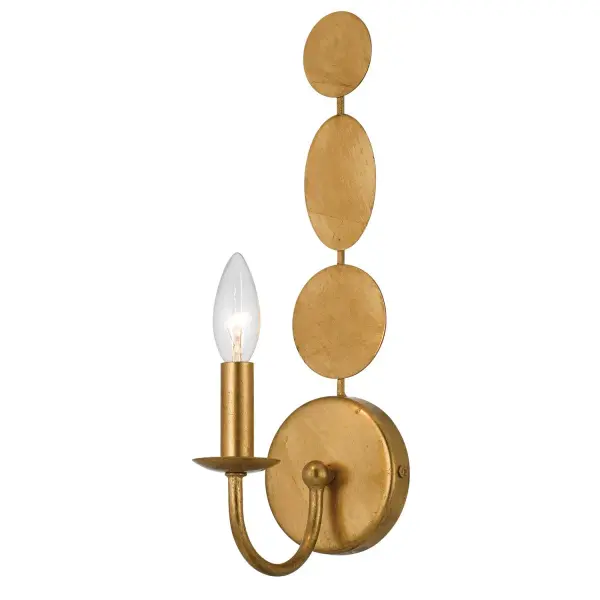 The Layla Sconce features wafer-thin concentric metal discs in Antique Gold, creating a sophisticated coastal-contemporary aesthetic. Its compact 4.25" width makes it ideal for smaller spaces while delivering maximum style impact.