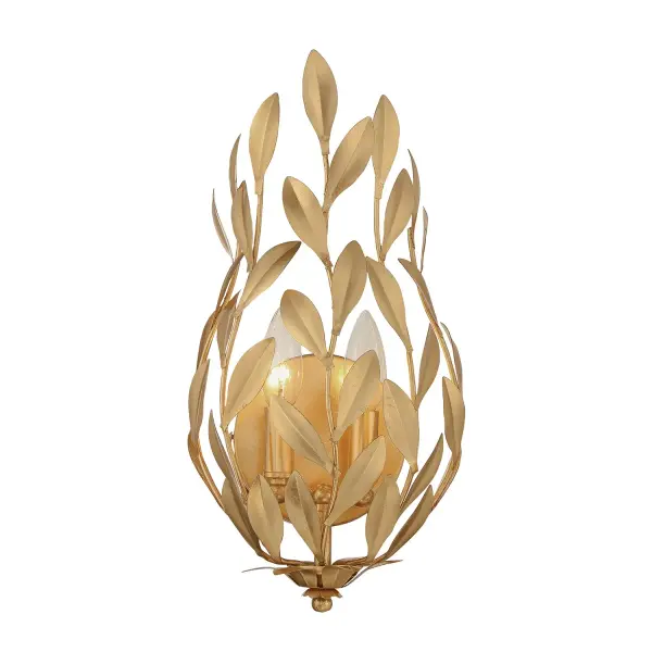 The Broche sconce features stunning wrought iron leaves in a shimmering Champagne Green Tea finish, delivering both beauty and function. Its tailored elegance suits transitional homes while versatile enough for modern spaces.