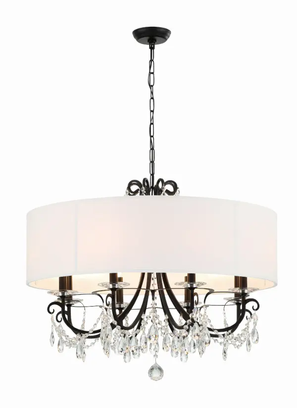 The Othello 32" chandelier masterfully blends traditional crystal elegance with contemporary matte black finish. Adorned with cascading crystal swags that capture and refract light beautifully, this statement piece adds instant glamour to any space while maintaining versatility through its modern finish. - alternate view