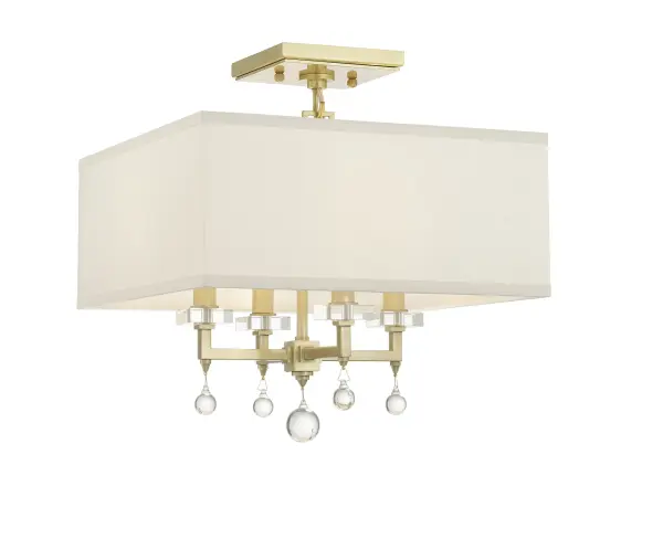The Paxton combines geometric glass bobeches with sleek crystal columns for a sophisticated, transitional look. Its 16" size and tailored shade make it perfect for bedrooms, hallways, and smaller living spaces seeking luxurious appeal.