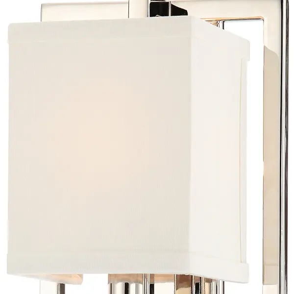 The Dixon sconce combines geometric precision with luxurious details, featuring a squared metal frame in polished nickel, white fabric shades, and gleaming crystal cube accents for refined transitional style. - alternate view