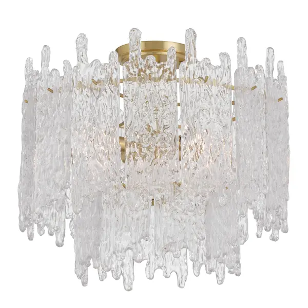 The Ackerly combines textured ice glass with aged brass for a stunning mid-century aesthetic. Its frosted, crystalline surface creates a soft, diffused glow while adding sculptural interest to any ceiling.