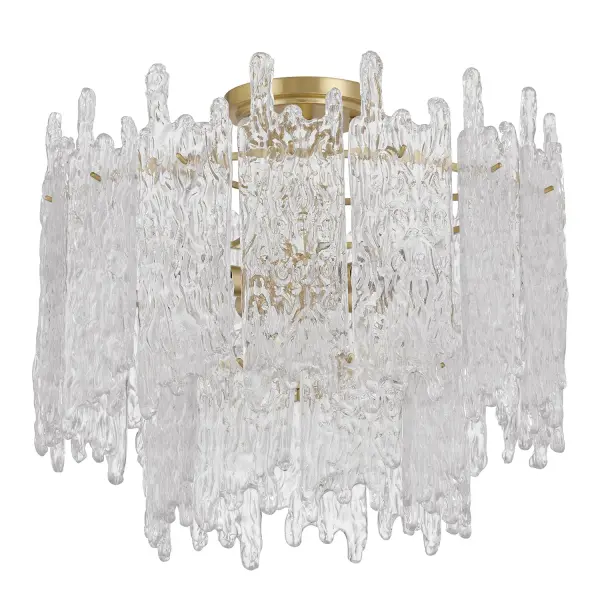 The Ackerly combines textured ice glass with aged brass for a stunning mid-century aesthetic. Its frosted, crystalline surface creates a soft, diffused glow while adding sculptural interest to any ceiling. - alternate view