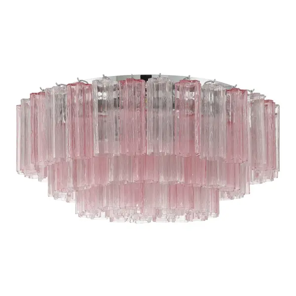 The Addis 32" Flush Mount reimagines the legendary mid-century Tronchi chandelier with transparent tiers of textured glass tubes arranged in a mesmerizing 5-point star. The Aged Brass frame and warm amber glass create sophisticated ambiance. - alternate view