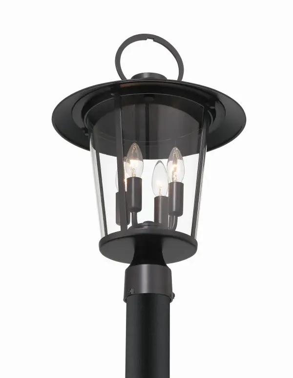 The Andover outdoor post light combines iconic street lantern design with contemporary farmhouse aesthetics. Its tapered column and clear glass panels deliver authentic charm and excellent illumination for various exterior settings. - alternate view