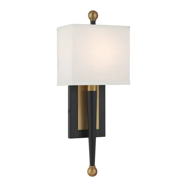 The Ardson 7" Sconce offers a refined balance of modern sophistication and classic charm. Its sleek tapered arm and white fabric half-shade create understated elegance, while ADA compliance ensures accessibility.