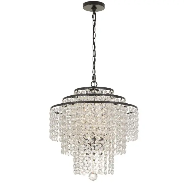 The Arielle 18" chandelier features layers of cascading crystal strands arranged on a circular tiered frame, creating optimal sparkle and a beautiful silhouette. Perfect for adding glamour to smaller spaces.