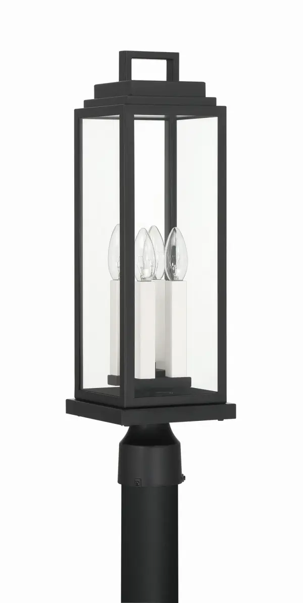 The Aspen Post Light combines classic lantern charm with contemporary geometric design. Clear glass panels and sleek black metal frame create timeless curb appeal, while versatile candle sleeves in white and gold finishes allow personalization. - alternate view