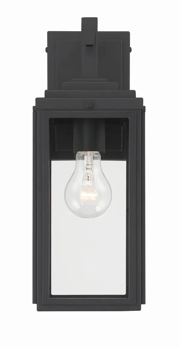 The Byron outdoor sconce combines modern design with transitional appeal through its tapered rectangular clear glass shade and matte black finish. Perfect for enhancing entryways, patios, and terraces with bright, unobstructed light. - alternate view