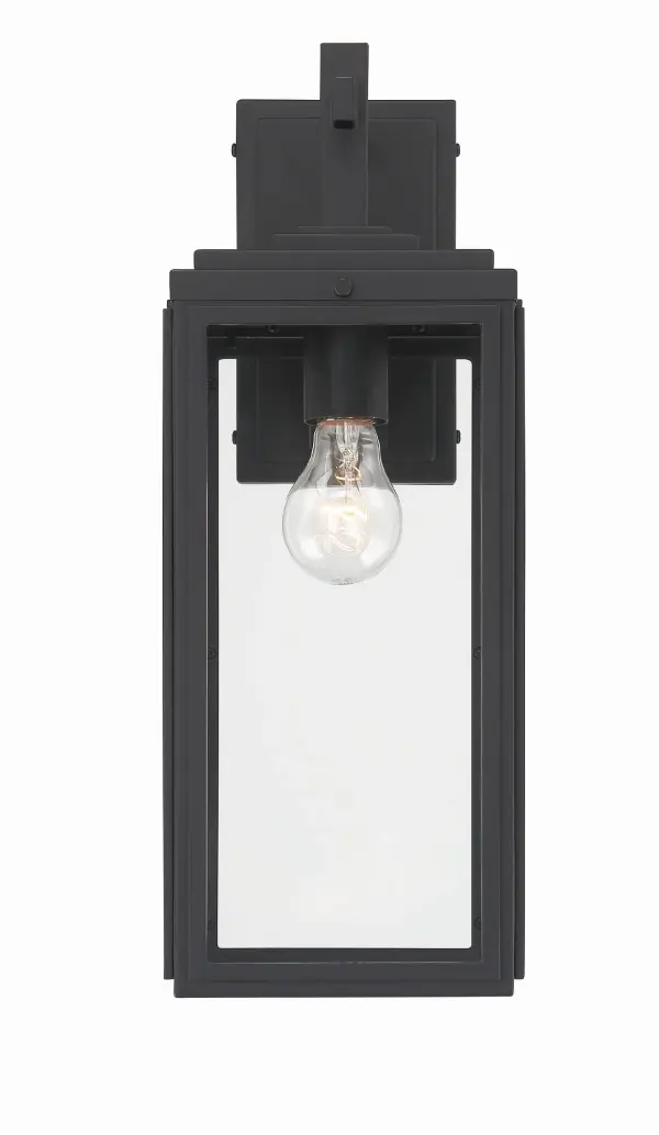 The Byron outdoor sconce combines modern design with transitional appeal through its tapered rectangular clear glass shade and matte black finish. Perfect for enhancing entryways, patios, and terraces with bright, unobstructed light. - alternate view