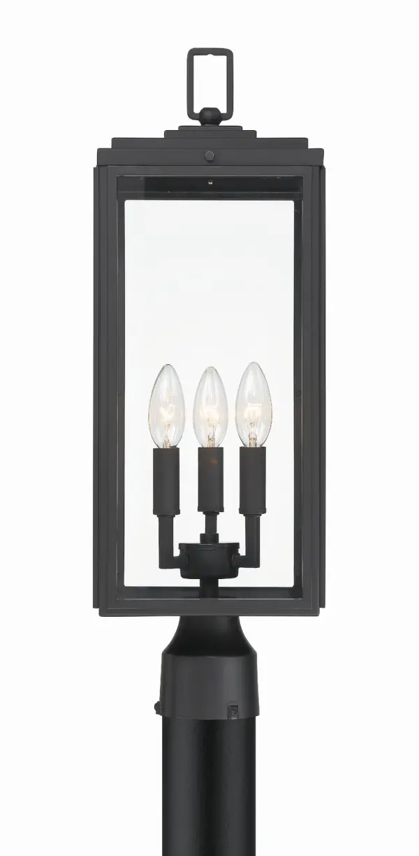 The Byron outdoor post light combines modern design with transitional appeal through its tapered rectangular clear glass shade and matte black finish. Perfect for enhancing entryways, patios, and terraces with bright, unobstructed light.