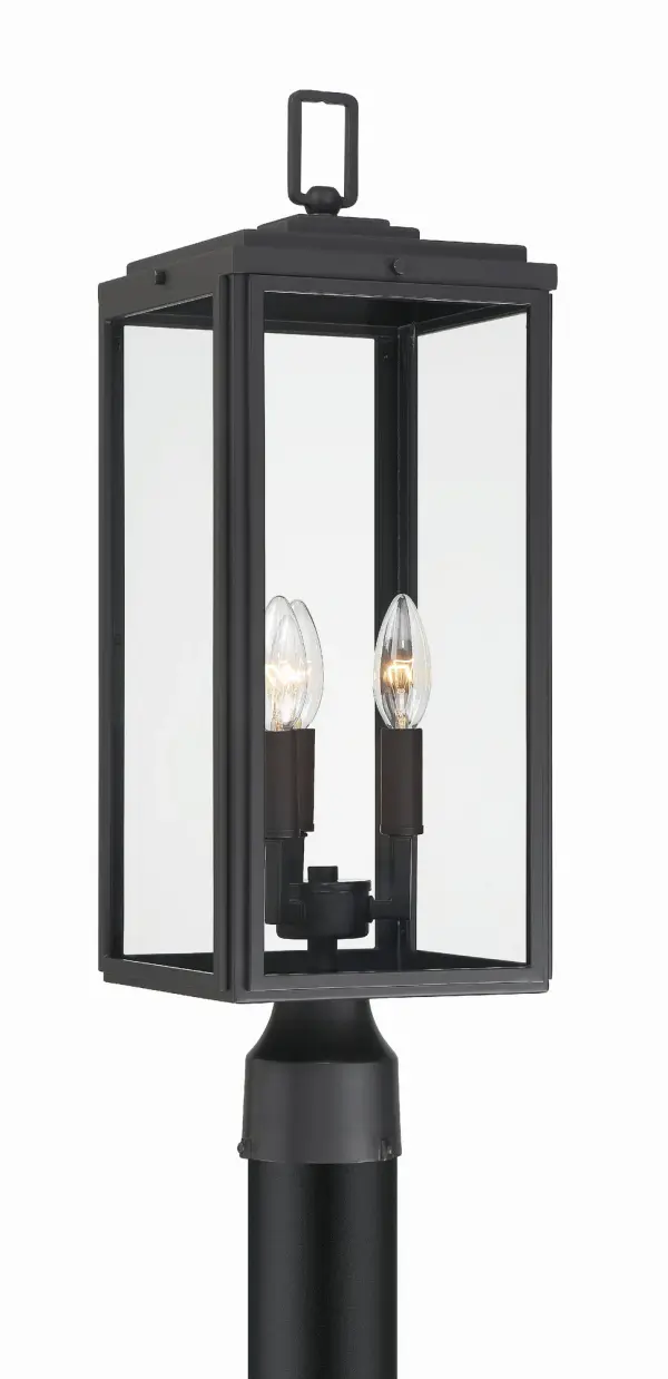 The Byron outdoor post light combines modern design with transitional appeal through its tapered rectangular clear glass shade and matte black finish. Perfect for enhancing entryways, patios, and terraces with bright, unobstructed light. - alternate view