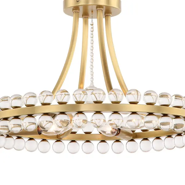 The Clover semi flush mount combines understated elegance with eye-catching sparkle. Solid glass balls on a floating aged brass frame create endless light reflections, making it a stunning focal point for bedrooms, living rooms, and entryways. - alternate view