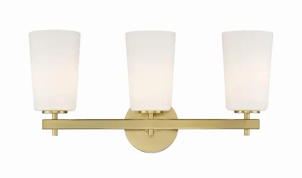 The Colton vanity light combines thoughtful simplicity with elegant design. Its distinctive opal white glass shade and aged brass finish create a warm, sophisticated look perfect for any bathroom style.