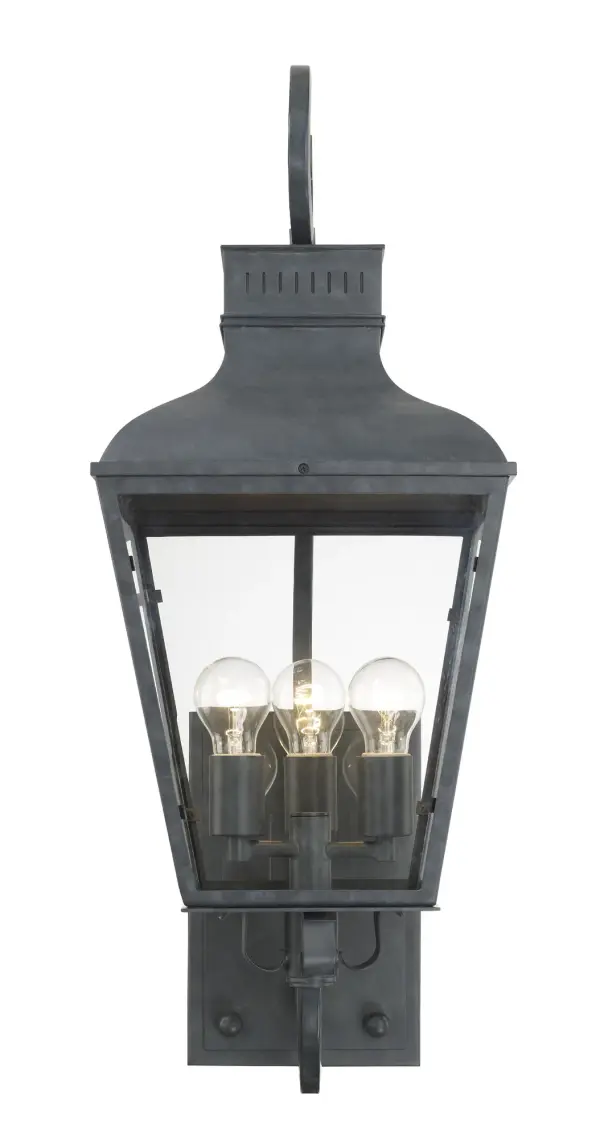 The Dumont outdoor sconce brings vintage charm with its classic street lantern silhouette. Durable steel construction in graphite finish paired with clear glass panels creates an elegant, weather-resistant fixture. - alternate view