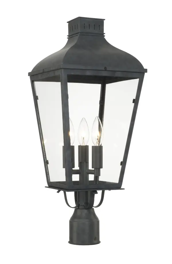 The Dumont outdoor post light brings vintage charm with its classic street lantern silhouette. Featuring durable steel construction in a sophisticated graphite finish and clear glass panels, it delivers old-world elegance.