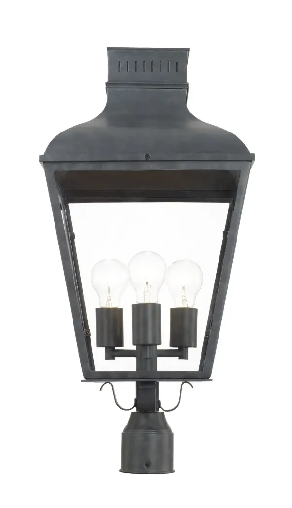 The Dumont outdoor post light brings vintage charm with its classic street lantern silhouette. Featuring durable steel construction in a sophisticated graphite finish and clear glass panels, it delivers old world elegance. - alternate view