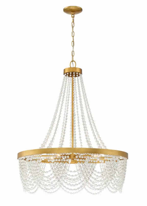The Fiona chandelier combines traditional empire silhouette with modern bohemian flair through cascading glass beads and antique gold finish. Its 27-inch width makes it versatile for dining rooms, bedrooms, and entryways.