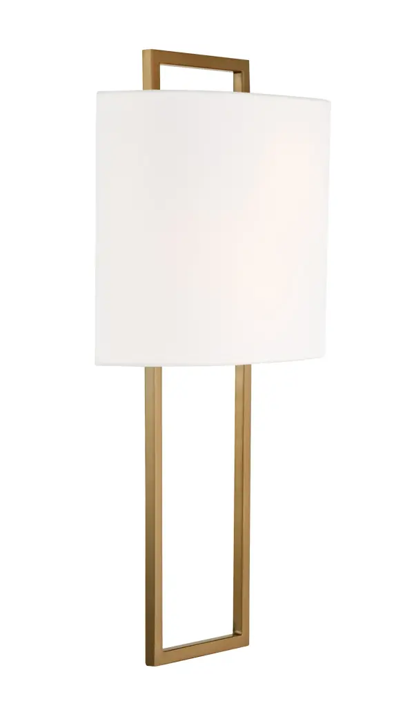 The Fremont sconce combines streamlined design with warm farmhouse charm. Its white fabric half drum shade creates a soft, diffused glow perfect for intimate spaces. ADA-compliant and damp-rated for versatile placement.