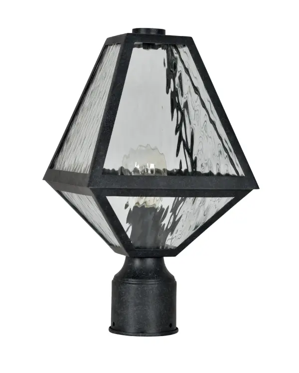 The Glacier 8" Outdoor Post Light brings architectural drama to outdoor spaces with its unique iceberg-inspired silhouette. Featuring angular lines and a distinctive tapered design, it pairs black charcoal finish with white opal glass for striking contrast. - alternate view