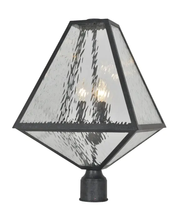 The Glacier 14" Outdoor Post Light brings architectural drama to outdoor spaces with its unique iceberg-inspired silhouette. Designed by Brian Patrick Flynn, it features angular lines and a distinctive tapered form.