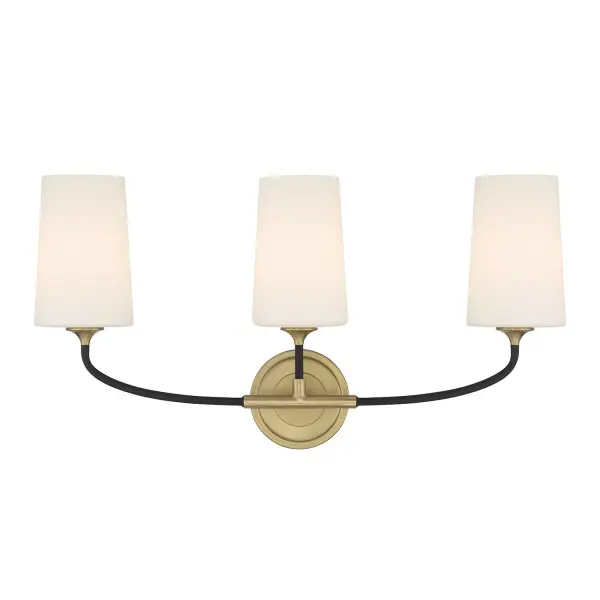 The Niles vanity light blends contemporary and industrial design with graceful upward-lifting arms and tapered white glass shades. Black forged metal frame with modern gold accents creates versatile appeal for various decor styles.