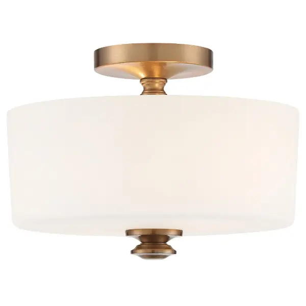 The Travis Semi Flush Mount combines a white glass shade with a chunky metal finial in Black Forged finish, creating soft, diffused lighting perfect for intimate spaces. Its transitional design bridges traditional and modern aesthetics.