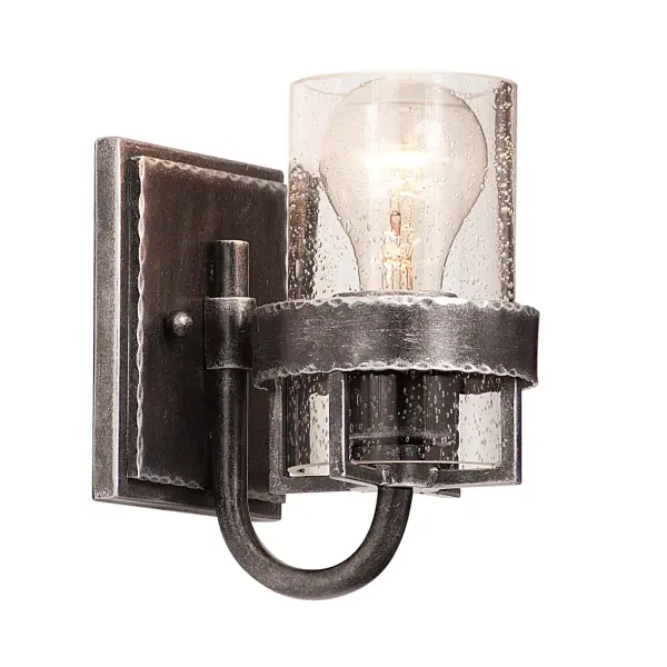The Bexley Collection showcases the simplicity and grace of industrial materials. While Kalco's exclusive Vintage Iron finish and Clear Seeded Glass shades look as if they was repurposed from a factory, they exist in a way that is uniquely elegant and only adds to the attractive quality of these pieces. Collection: Bexley Rooms: Bathroom, Vanity, Spa, Powder Room Finish: Vintage Iron Width: 5.00" Height: 7.00" Weight: 3.00 lb Extension from Wall: 5.50" Wire: 6" Mounting Height: 3.50" Canopy: 5"x5"x0.75" Number of Bulbs: 1 Maximum Wattage: 100.00 W Bulb Base: E26 Medium Dimmable Voltage: 120.00 V Material: Hand Forged Wrought Iron , Glass , Fabric Country of Origin: Phillipines Safety Listing: cETL Safety Rating: Dry