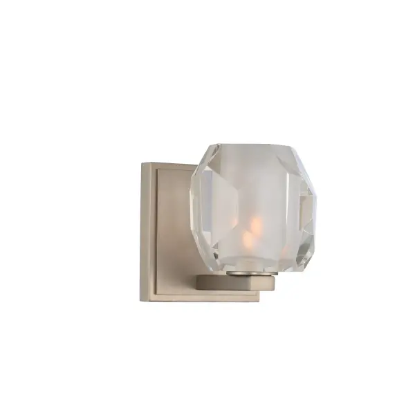 With a faceted clear optic glass and a sleek frosted interior, Regent is featured in a Satin Nickel or Vintage Bronze finish. This Zen design is enhanced with a concealed mounting system to offer a clean design that shows no visible lock up hardware. Collection: Regent Rooms: Bathroom, Vanity, Spa, Powder Room Finish: Satin Nickel Width: 5.00" Height: 5.00" Weight: 5.00 lb Extension from Wall: 5.00" Wire: 12" Mounting Height: 3.00" Canopy: 4.5"x1"x4.5" Bulbs Included Number of Bulbs: 1 Maximum Wattage: 3.00 W Bulb Base: G9 Light Source: LED Light Output: 300.00 lm Color Temperature: 3000 K Dimmable Voltage: 120.00 V Material: Heavy Gauge Steel , Glass Country of Origin: China Safety Listing: cETL Safety Rating: Dry LED