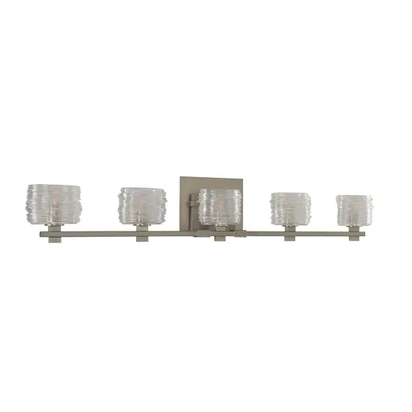 This series features Oval Spun Glass on a high styled frame with beautiful details including thedefined holders and arms that swoop onto the mounting plates. Available in 1 thru 5 light versions, and in your choice of Vintage Bronze or Satin Nickel. Collection: Clearwater Rooms: Bathroom, Vanity, Spa, Powder Room Finish: Satin Nickel Width: 37.00" Height: 6.50" Weight: 11.00 lb Extension from Wall: 4.00" Wire: 6" Mounting Height: 2.75" Canopy: 6.5"x5"x0.75" Bulbs Included Number of Bulbs: 5 Maximum Wattage: 3.00 W Bulb Base: G9 Light Source: LED Light Output: 1500.00 lm Color Temperature: 3000 K Dimmable Voltage: 120.00 V Material: Heavy Gauge Steel , Spun Glass Country of Origin: China Safety Listing: cETL Safety Rating: Dry ADA LED