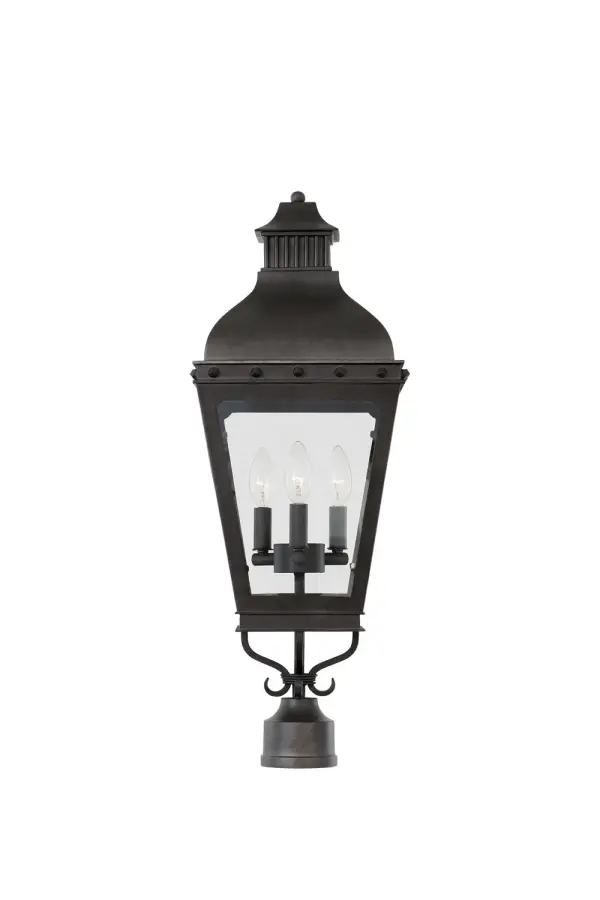 Timeless elegance is the look and feel of the Winchester Lantern Collection. Classic burner details on the crown, banding accented with hand crafted buttons, and the full bodied tapered frame make this a standout. Supplied with Clear Glass Panels and a Powder Coated Aged Iron Finish. Collection: Winchester Outdoor Rooms: Outdoor, Garage, Patio, Retaining Walls Finish: Aged Iron Width: 10.00" Height: 29.00" Weight: 14.00 lb Number of Bulbs: 3 Maximum Wattage: 40.00 W Bulb Type: Candelabra Bulb Base: E12 Candelabra Dimmable Voltage: 120.00 V Material: Aluminum , Glass Country of Origin: Phillipines Safety Listing: cETL Safety Rating: Wet