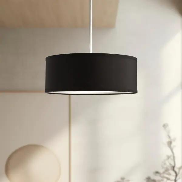 The Gregory pendant combines contemporary style with warm functionality. Its textured linen shade and acrylic diffuser create soft, ambient lighting perfect for intimate spaces. The clean drum silhouette works across modern and transitional interiors. - alternate view