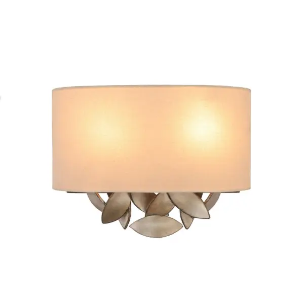 Nature Inspired Hand Forged Wrought Iron with a Moon Silver finish and beige linen shade. Collection: Eden Rooms: Living Room, Bedroom, Family Room, Dining Room Finish: Moon Silver Width: 14.00" Height: 10.00" Weight: 5.00 lb Extension from Wall: 4.00" Wire: 6" Mounting Height: 4.00" Canopy: 12"x4"x0.75" Number of Bulbs: 2 Maximum Wattage: 40.00 W Bulb Type: E12 Bulb Base: E12 Candelabra Dimmable Voltage: 120.00 V Material: Hand Forged Wrought Iron , Linen Country of Origin: Phillipines Safety Listing: cETL Safety Rating: Dry ADA