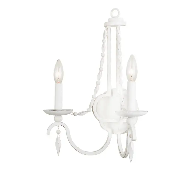Southern Charm meets Farmhouse Chich with a Distressed White Wall Sconce featuring twisted authentic Gmelina Wood beading and steel frame construction. Collection: Acadia Rooms: Living Room, Bedroom, Family Room, Dining Room Finish: Distressed White Width: 13.00" Height: 18.00" Weight: 3.00 lb Extension from Wall: 7.00" Wire: 6" Mounting Height: 12.00" Canopy: 6"x1" Number of Bulbs: 2 Maximum Wattage: 60.00 W Bulb Type: Candelabra Bulb Base: E12 Candelabra Dimmable Voltage: 120.00 V Material: Steel , Wood Country of Origin: Phillipines Safety Listing: cETL Safety Rating: Dry