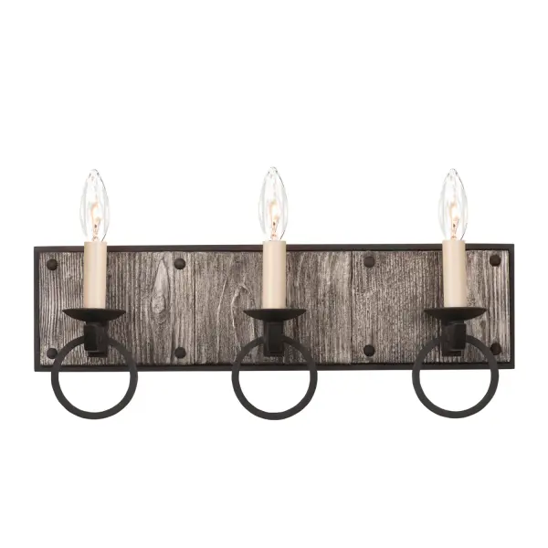 Modern Farmhouse inspired design with Black Iron ring and rivet hardware detail and finish featuring Burnt Silver Wood accents. Collection: Laramie Rooms: Bath, Vanity, Foyer, Laundry Finish: Black Iron Notes: Silver Burnt Wood Accents Width: 19.00" Height: 10.00" Length: 4.00" Weight: 6.00 lb Extension from Wall: 4.00" Wire: 7" Mounting Height: 6.00" Canopy: 19"x5"x1" Number of Bulbs: 3 Maximum Wattage: 60.00 W Bulb Type: Candelabra Bulb Base: E12 Candelabra Dimmable Voltage: 120.00 V Material: Steel , Aluminum , Wood Country of Origin: Philippines Safety Listing: cETL Safety Rating: Damp ADA