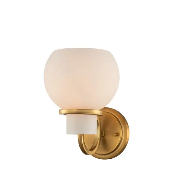 The Ascher is a traditional hurricane collection that has been updated for sophisticated 21st century interiors. Double ring details in the Winter Brass (WB) frame hold the frosted glass hurricanes. This collection follows the Kalco tradition of function and beauty in harmony. Collection: Ascher Rooms: Bed, Bath, Hall, Office Finish: Winter Brass Glass: White Opal Glass Width: 6.00" Height: 9.00" Length: 8.00" Weight: 2.00 lb Extension from Wall: 8.00" Wire: 7" Mounting Height: 7.00" Canopy: 5"x5" Number of Bulbs: 1 Maximum Wattage: 40.00 W Bulb Type: Candelabra Bulb Base: E12 Candelabra Dimmable Voltage: 120.00 V Material: Steel, Glass Country of Origin: China Safety Listing: cETL Safety Rating: Damp